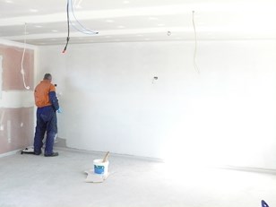 First coatof paint goes on.